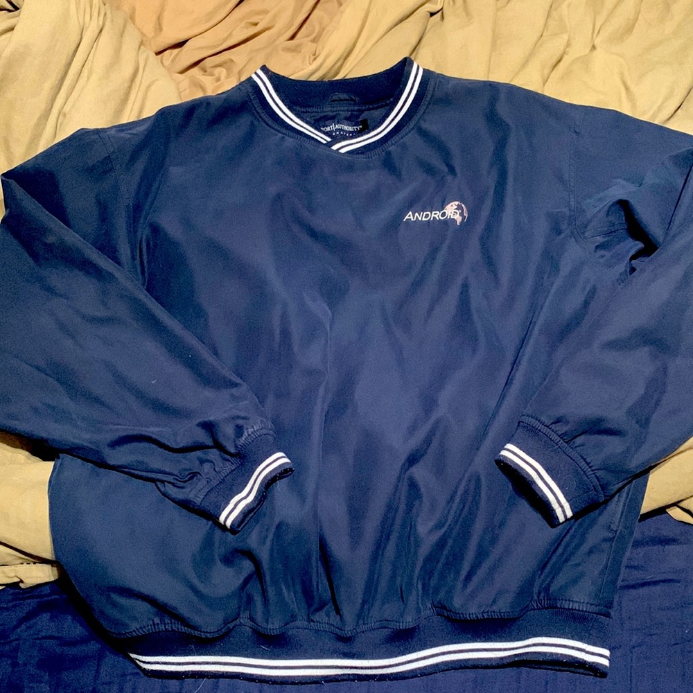 Port Authority signature pull over jacket with Android Industries logo on front.